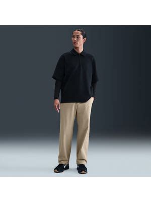 Buy Nike 24.7 PerfectStretch Men's Dri-FIT Loose-Fit Chino Trousers ...