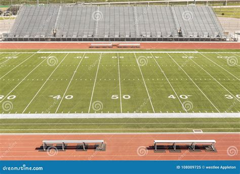 Football Field at the 50 Yard Line Stock Image - Image of school, lines ...