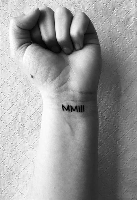 2003 Roman Numerals Tattoo - Printable Calendars AT A GLANCE