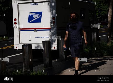 U.S. Postal Service (USPS) trucks are parked at a post office on August 23, 2024 in Glendale, Califo