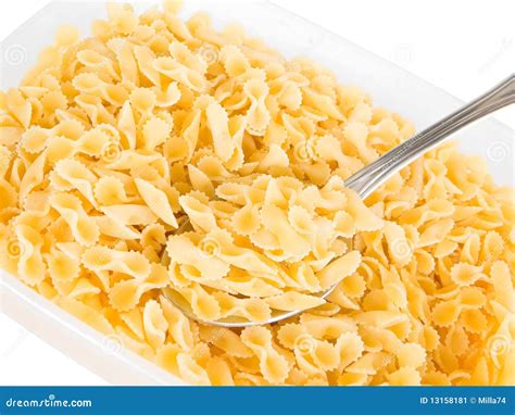 Short-cut Pasta with Spoon in Plastic Container. Stock Image - Image of ...