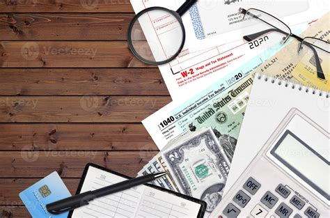 IRS form 1040 Individual income tax return and W-2 wage and tax ...