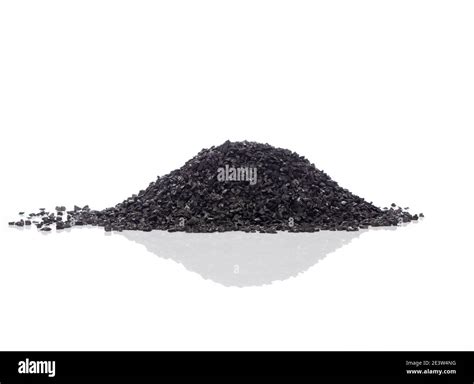 Graphite powder is generally used as lubricant. Isolated on white Stock ...