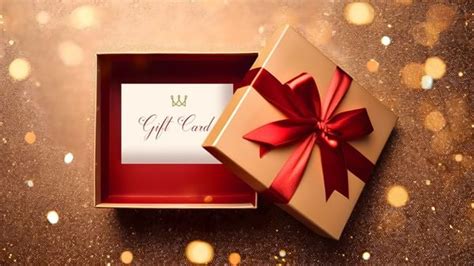 Gift box with a red bow and e-gift card at Warwick Hotels and Resorts
