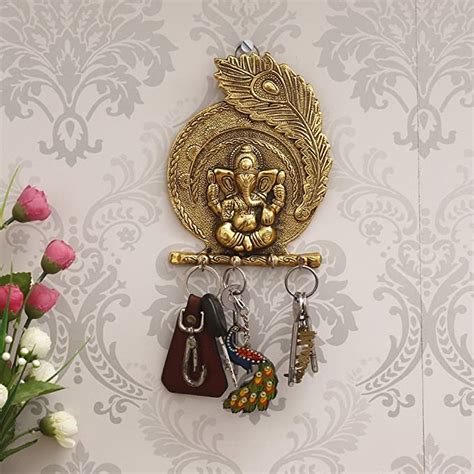 eCraftIndia Metal Golden Lord Ganesha Mor Pankh 4 Hooks Key Holder, One ...
