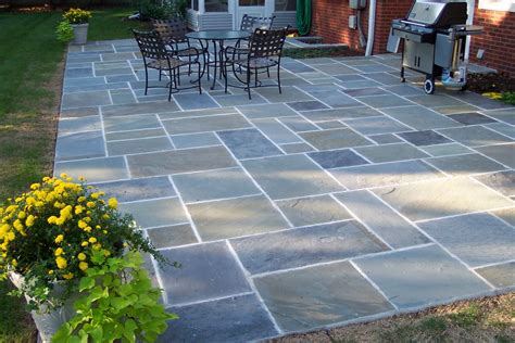 Masonry | J & S Landscape & Masonry | Patio stones, Stone patio designs ...