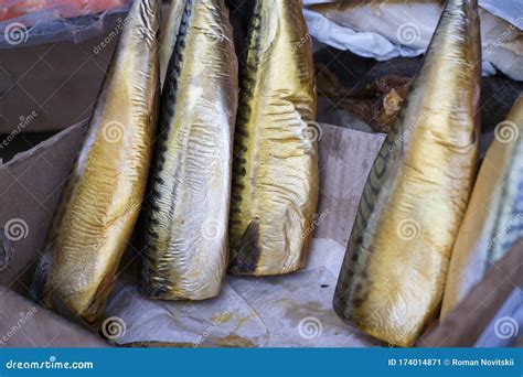 Cold-smoked Mackerel in a Corrugated Box on the Counter. Background ...