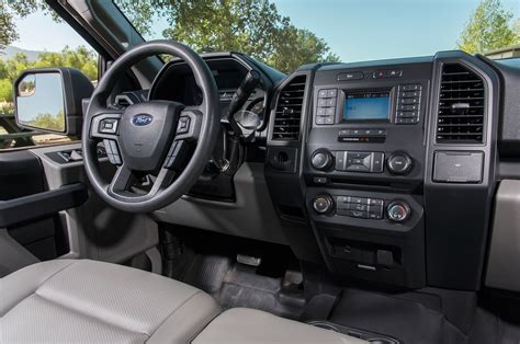 2018 Ford F 150 4x2 Supercab XL front interior steering wheel and center stack - Motor Trend en ...