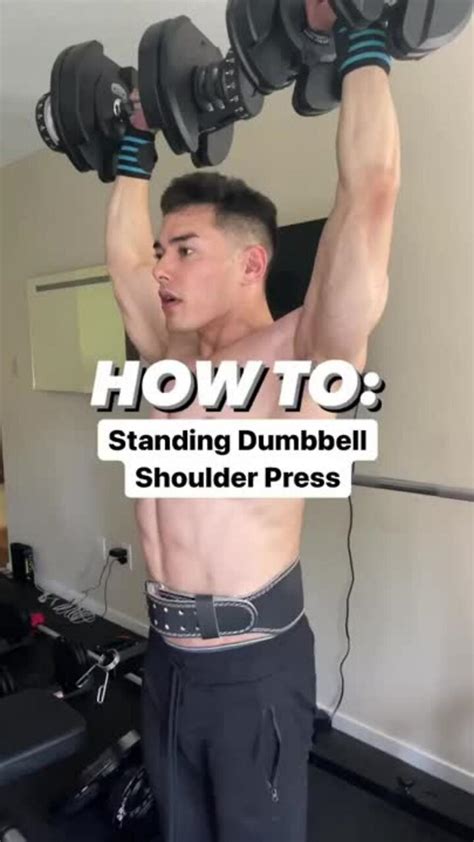 STANDING DUMBBELL MILITARY PRESS - Build HUGE - One News Page VIDEO