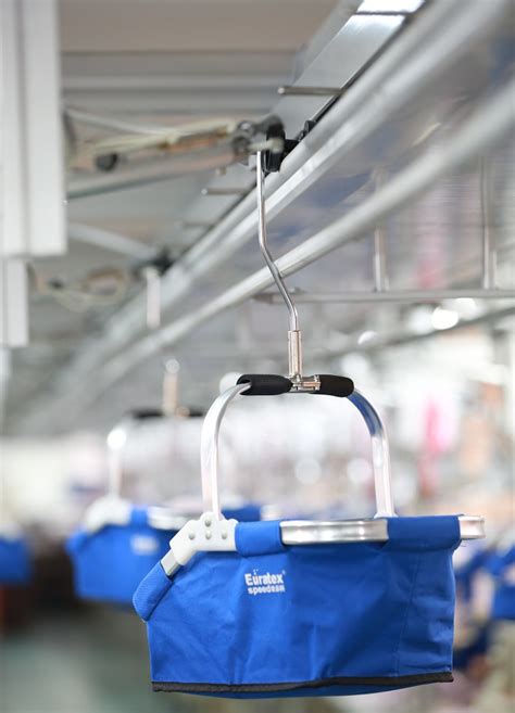 ED3000吊篮式自动吊挂流水线系统 - 服装智能吊挂系统 - 产品中心 - 东莞倍成智能设备科技有限公司