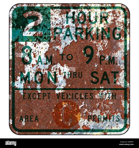 Old rusty American road sign - Parking with time and permit ...