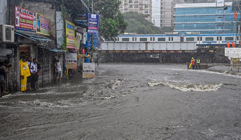 Heavy rain lashes Mumbai, many areas inundated, local train services ...