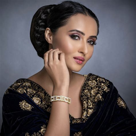 Sukkhi Incredible Pearl Gold Plated Meenakari Bracelet Worn By Karisma ...