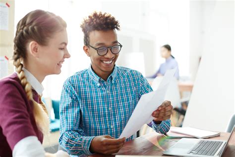 Stock photo 1089791576 - Two happy college friends or intercultural ...