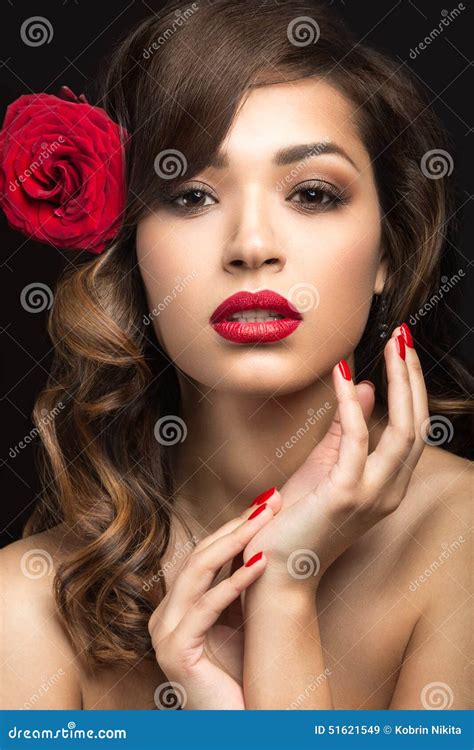 Beautiful Girl In The Spanish Way Of Carmen With Red Lips And A Rose In ...