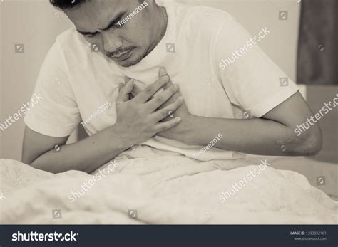Asian Man Has Chest Pain While Stock Photo 1393032161 | Shutterstock