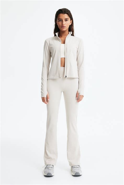 Zip-through sports jacket with SoftMove™ - Light taupe - Ladies | H&M IN