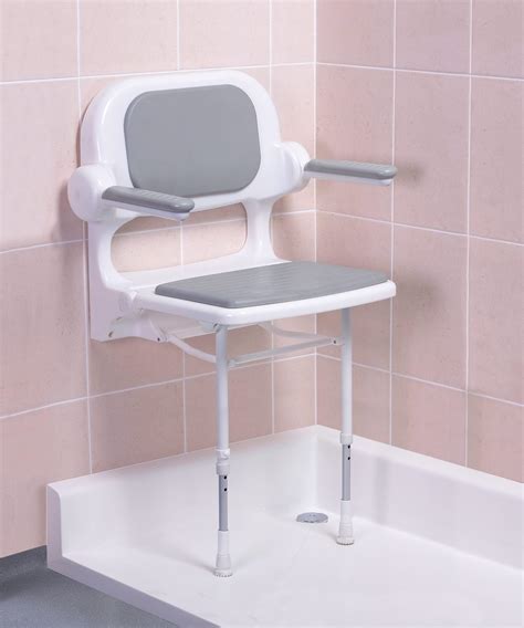 Wall mounted folding fold down shower seat with legs and padded seat ...