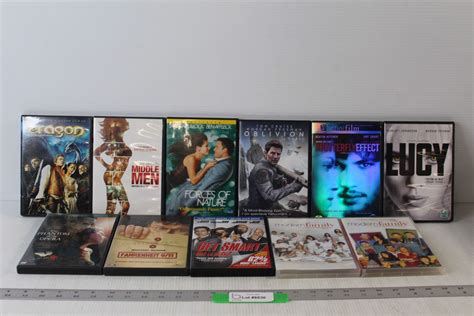 (16) DVD Movies TV Shows - Modern Family, Eragon, Oblivion, etc ...
