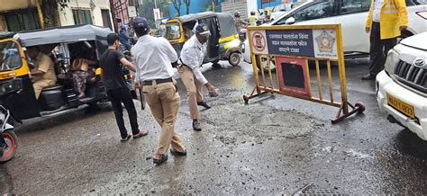 In Pics: Kandivali Traffic Police Repair Pothole To Prevent Accidents ...