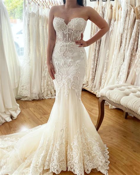Fitted mermaid style wedding dress with a sweetheart neckline, corset bodice and gorgeous lace ...