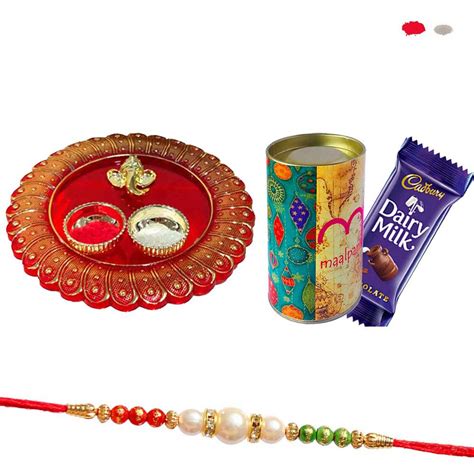 Maalpani Fancy Pearl Rakhi - Pooja thali and Fancy Tin Cane - Rakhi ...