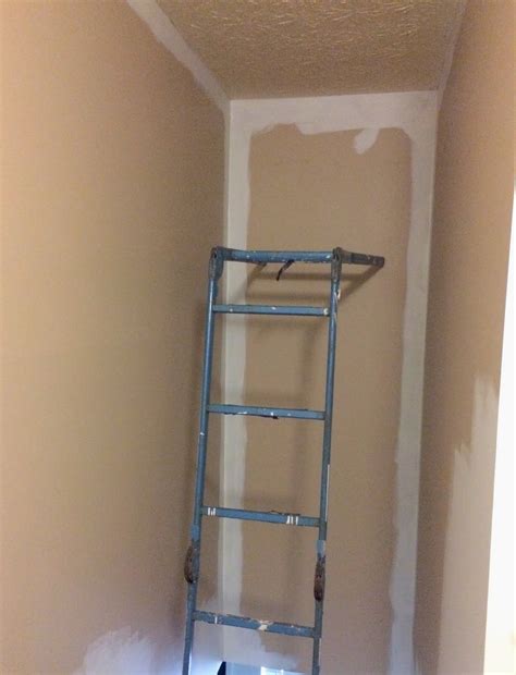 How to Paint a Tall Hallway Above Stairs | Stair decor, Above stairs ...