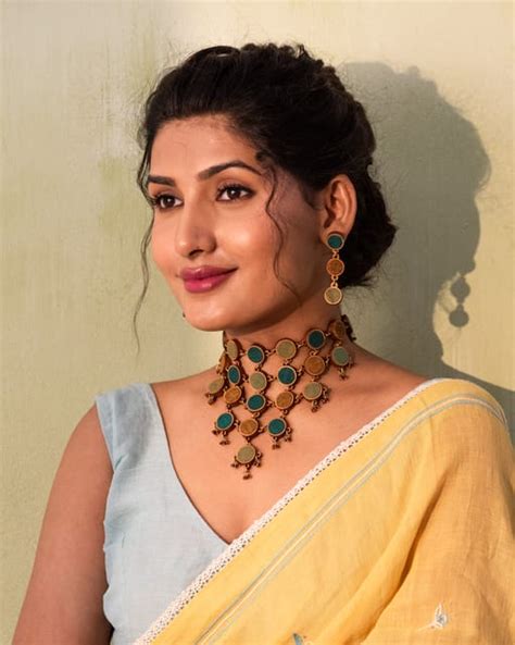 Shop Green & Brown Round Earrings by WHE by Abira on CreCo.in