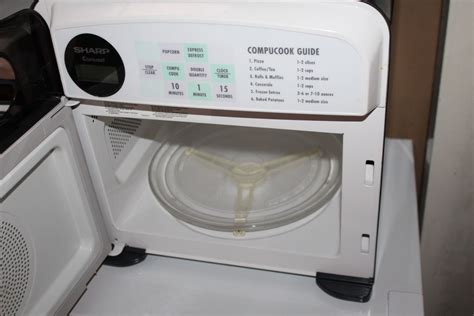 BLACK SHARP CAROUSEL HALF PINT MICROWAVE OVEN