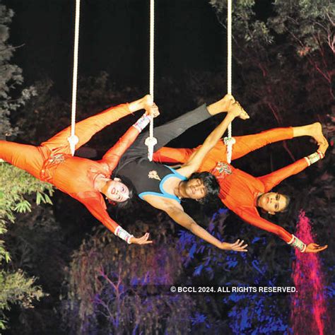 Artists perform acrobatics during a Charity Ball, hosted by the ...