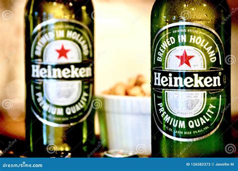 Pair of Heineken beers editorial stock photo. Image of close - 126582373
