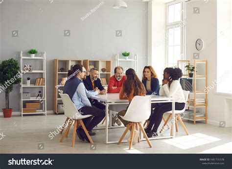 Committee around a Table 的图像结果