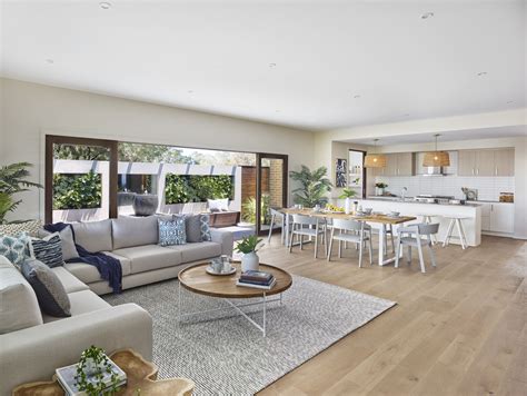 The coastal, free flowing open plan living area with a seemingly ...