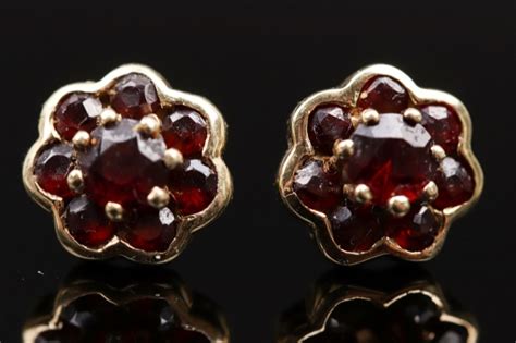 ratisbon's | Red garnet flower shaped ear studs | DISCOVER GENUINE ...