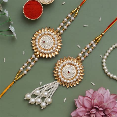 eCraftIndia Pearls Designer Bhaiya Bhabhi Rakhi Set with Roli Chawal P