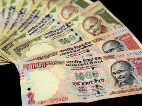 Mad scramble for Rs 2.25L in banned currency notes dumped in drain ...