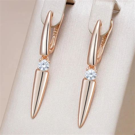 Earrings with Shiny Tips in Elegant Gold – Claire Jewelry