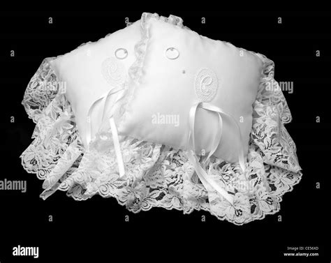 Wedding rings on cushions hi-res stock photography and images - Alamy