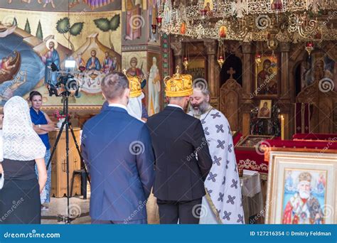 A Priest Reads a Prayer at the Wedding Ceremony Held in the Orthodox ...