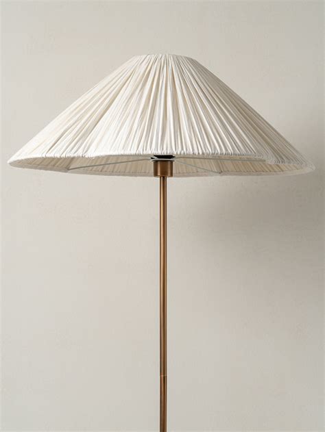 Lindi - aged brass and linen scalloped floor lamp