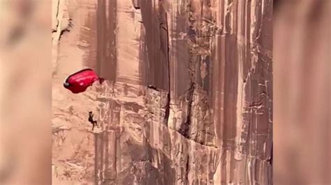 Utah BASE jumper slams into side of mountain, dangles in air after ...