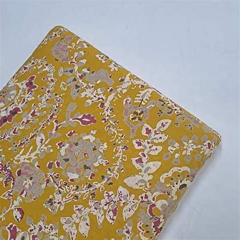 Yellow Color Cotton Cambric Discharge Printed Fabric