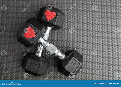 Pair of 15-pound Dumbbells on a Black Gym Floor, Red Sparkly Hearts ...