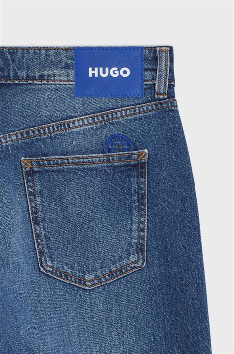 HUGO - Long-length straight-fit jeans in blue stretch denim - Blue