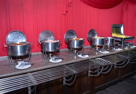 Table with snacks party buffet with various savory foods | Premium Photo