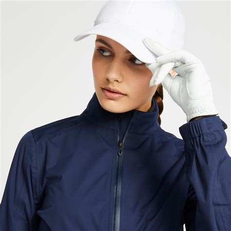 Women's golf waterproof rain jacket - RW500 navy blue INESIS | Decathlon