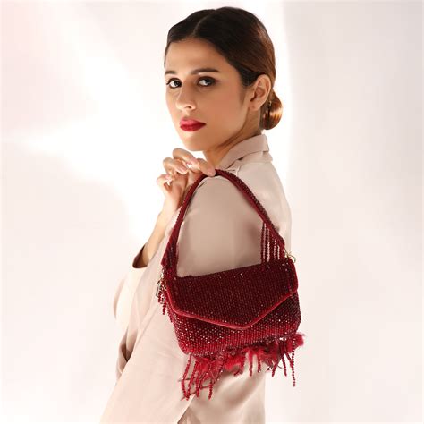 Quirky Tales - Designer Handbags and Clutch bags