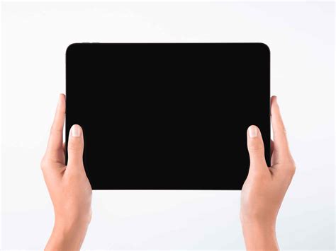 Free Hand Holding Tablet iPad Mockup (PSD)