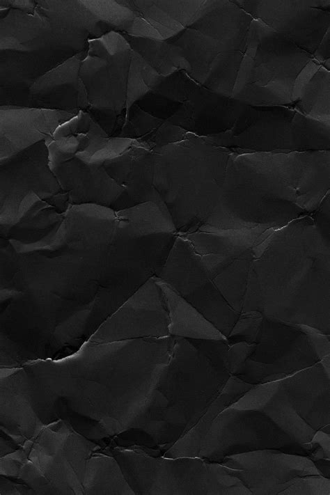 Black Crumpled Paper Background