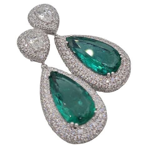 GIA and IGI Certified 7 Carat Vivid Green Emerald and Marquise Diamonds ...